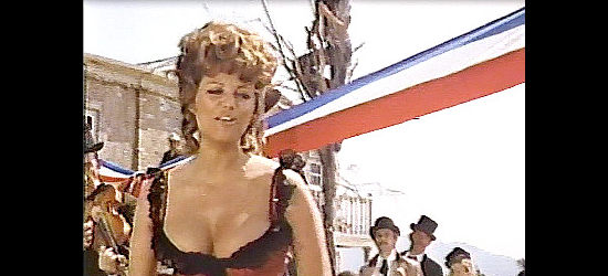 Claudia Cardinale as Marie, performig at the town's holiday celebration in The Legend of Frenchie King (1971)