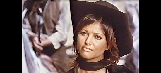 Claudia Cardinale as Marie, trying to push five ladies off the Little Pee Ranch in The Legend of Frenchie King (1971)
