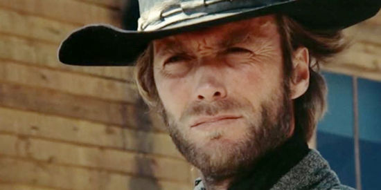 Clint Eastwood as The Stranger, arriving in Lago in High Plains Drifter (1973)