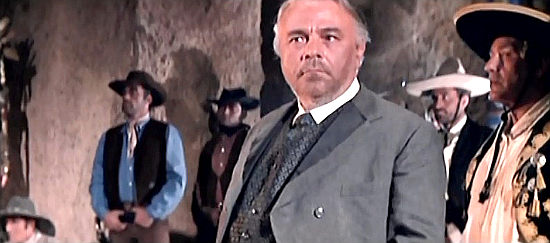 Amedeo Trilli as Mr. Walcom, a gunrunner concerned for his grandson's safety in Three Bullets for Ringo (1966)