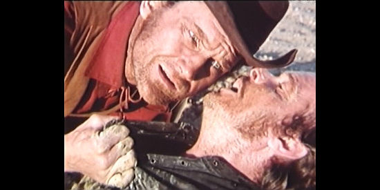 Donald O'Brien as Jack Forrest gets a dying secret from Dino Strano as Dexter in Finders Killers (1971)