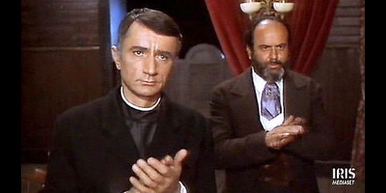 Evar Maran as The Priest whose church is torched by El Diablo in Lola Colt (1967)