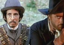 Fidel Gonzalez as Fidelio and Gianni Garko as Django in $10,000 Blood Money (1967)