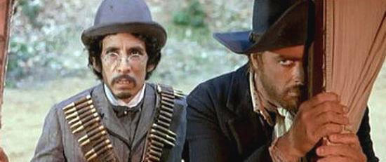 Fidel Gonzalez as Fidelio and Gianni Garko as Django in $10,000 Blood Money (1967)