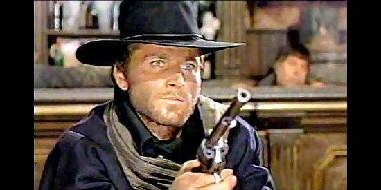 Franco Nero as Django makes a point, at gunpoint, in Django (1966)