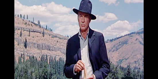 Gary Cooper as Doc Joe Frail, arriving in a Montana boom town and looking to buy property in The Hanging Tree (1959)