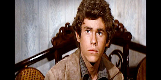 Gary Grimes as Danny, upset that J.D. Cahill spends more time chasing outlaws than with his two sons in Cahill U.S. Marshal (1973)