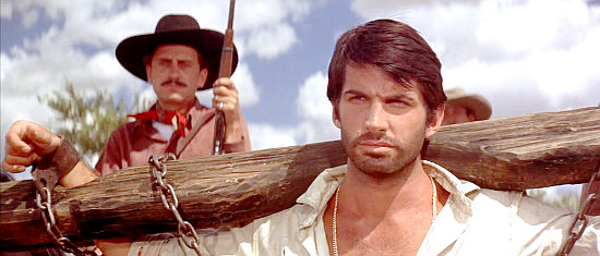 George Hamilton as Flores, the man who turns Maria I into a revolutionary fighter in Viva Maria! (1965)