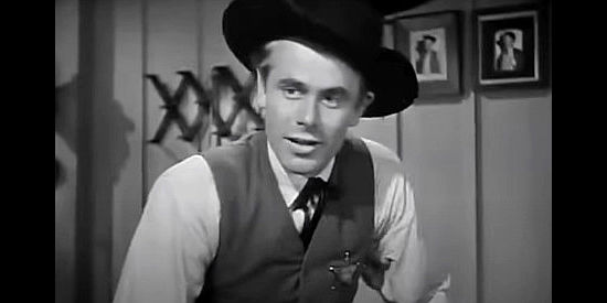 Glenn Ford as Tex Miller, the sheriff who falls for a girl known as 'Bill' in Go West Young Lady (1941)