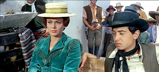 Gloria Osuna as Susan Westfall, fearing the outcome of a trial will put Jeff Walker in danger in Gunfight at High Noon (1964) 