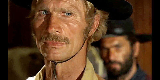 Gordon Mitchell as Gordon Mitchell, one of Flanagan's hired guns in His Name was Sam Walbash, But They Called HIm Amen (1971)