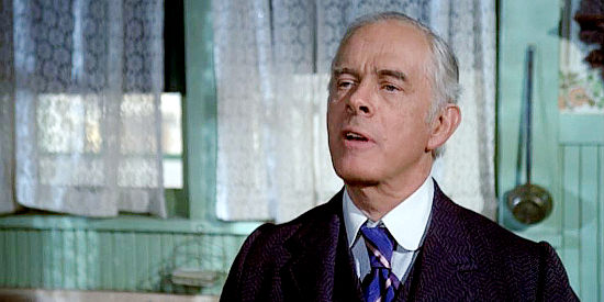 Harry Morgan as Marshal Walter Thibido, hoping J.B. Brooks doesn't linger too long in Carson City in The Shootist (1976)
