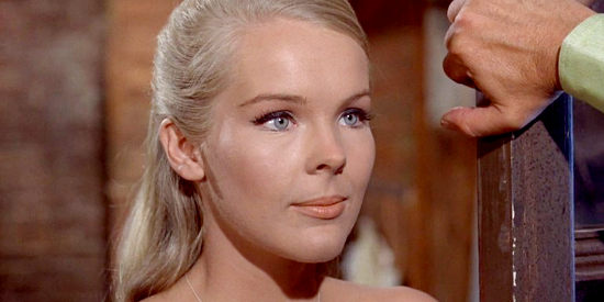 Janet Landgard as Kate Mayfield, urging her father to finally stand up against Vince Carden in Land Raiders (1969)