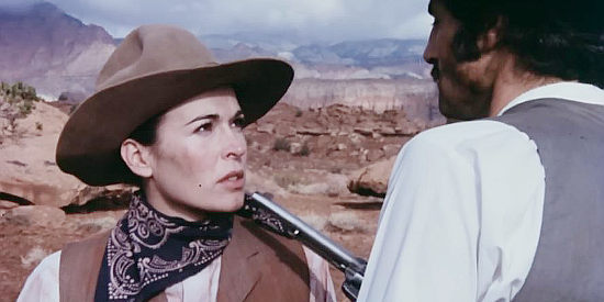 Jennifer Bishop as Rachel, being taken into custody by lawman Clay (Geoffrey Land) in Jessi's Girls (1975)