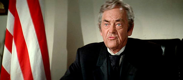 John McIntire as Judge Parker, growing weary of Rooster Cogburn's knack for bringing them back dead in Rooster Cogburn (1975)