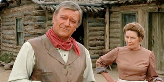 John Wayne as Wil Andersen and wife Annie (Sarah Cunningham) meeting Jebediah Nightlinger in The Cowboys (1972)
