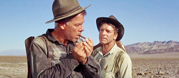 Lee Marvin as Farden and Burt Lancaster as Dolworth, discussing how best to stop Raza in The Professionals (1966)