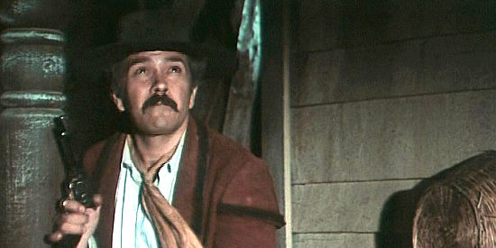 Lucio De Santis as Jim Santamaria, trying to track down Gary Hamilton in And God Said to Cain (1969)