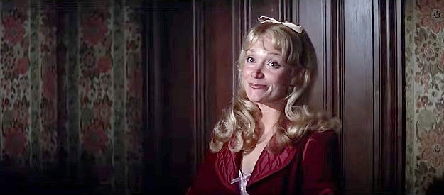 Lynne Marta as Elma, Frank Harlan's female companion in Joe Kidd (1972)