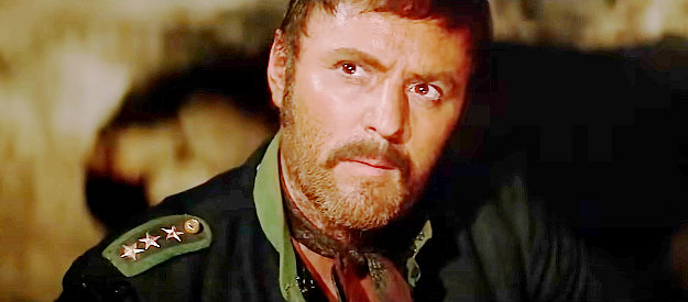 Manuel Fabregas as Col. Beltran, the revolutionary leader Hogan has been hired to help in Two Mules for Sister Sara (1970)
