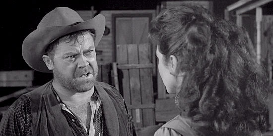 Mickey Shaughnessy as Al Cruze, learning from Selah about the trouble facing his friend Johnny Bishop in The Hangman (1959)