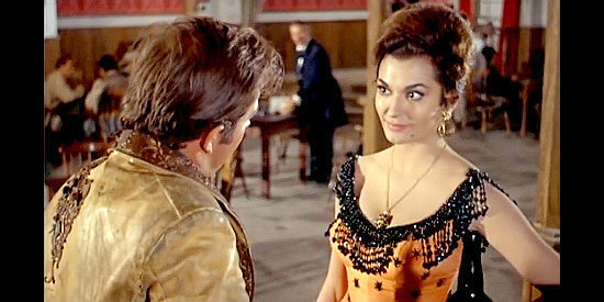 Mikaela as Maria Huertas, the saloon girl who's moved on since Gringo rode off in Gunfight at Red Sands (1963)