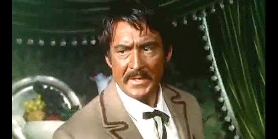 Mirko Ellis as Navarro, concerned that Laskey doesn't quite have the situation under control in El Rojo (1966)