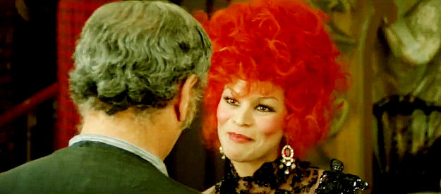 Mirta Miller as Madam Red in Shoot First, Ask Questions Later (1975)