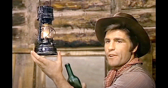 Nino Benvenuti as Ted Mulligan, welcoming Monty to his frontier cabin in Alive or Preferably Dead (1969)
