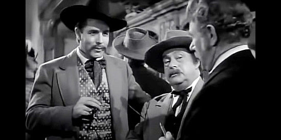 Onslow Stephens as Tom Hannegan, the businessman who bails out colleagues who've been robbed by Killer Pete in Go West Young Lady (1941)