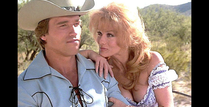 Arnold Schwarzenegger as Handsome Stranger and Ann-Margret as Charming Jones in The Villain (1979)
