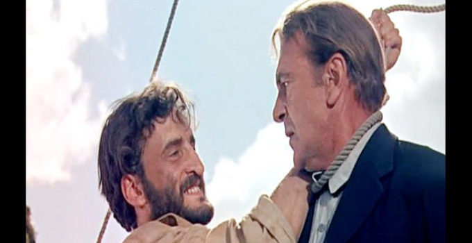 George C. Scott as Dr. George Grubb, slipping a noose around the neck of Doc Joe Frail (Gary Cooper) in The Hanging Tree (1959)