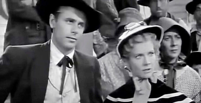 Glenn Ford as Tex Miller and Penny Singleton as Belinda Pendergast arrive in Headstone in Go West Young Lady (1941)