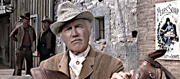 Patric Knowles as Henry Tunstall, trying to find a peaceful solution to the problems in Lincoln in Chisum (1970)