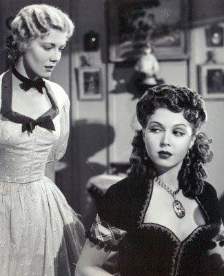 Penny Singleton as Belinda Pendergast and Ann Miller as Lola in Go West Young Lady (1941)