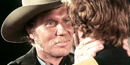 Peter Carsten as Acombar, the man who framed Gary, welcoming his son home in And God Said to Cain (1969)