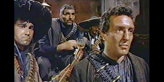 Remo De Angelis (Erik Schhippers) as Riccardo, one of the general's men demanding Maria's affection in Django (1966)