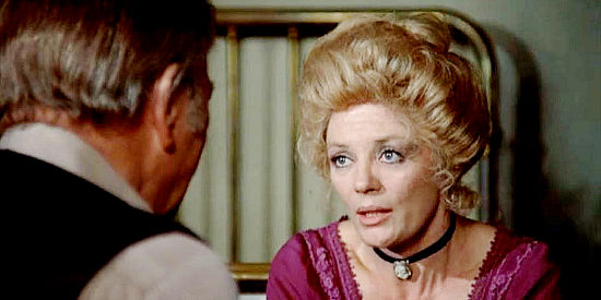 Sheree North as Serepta, an old lover hoping to cash in by marrying J.B. Brooks just before his death in The Shootist (1976)