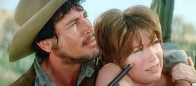 Shirley MacLaine as Sara, being harassed by one of three ruffians intending her harm in Two Mules for Sister Sara (1970)