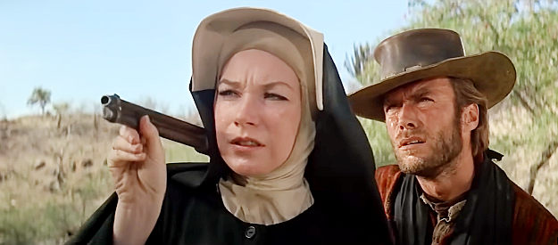 Shirley MacLaine as Sister Sara, offering a shoulder for support as a wounded Hogan (Clint Eastwood) practices his aim in Two Mules for Sister Sara (1970)