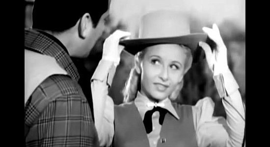 Vera Ralston as Karen Alderson, flirting with her father's ranch foreman in Wyoming (1947)