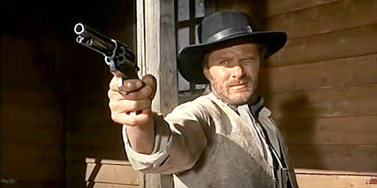 William Berger as El Cisco (Larry), shooting his way out of a jam in El Cisco (1966)