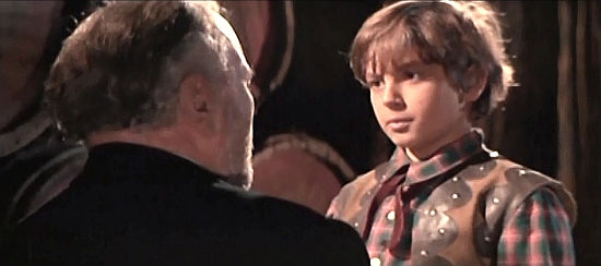 Willy Miniver as Willy Carson, son of Ringo and Jane, meeting with his grandfather in Three Bullets for Ringo (1966)