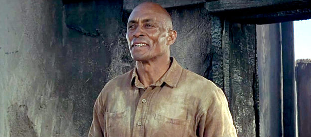 Woody Strode as Jake, marveling over Dolworth's survival skills in The Professionals (1966)