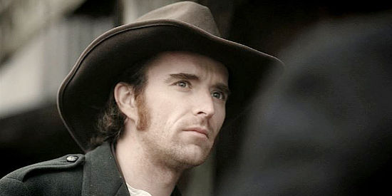 Andrew Galligan as Jesse James, helping bring law to Horseshoe Pass in a deal with the sheriff in Jesse James Lawman (2015)