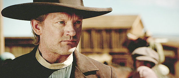 Douglas Henshall as Sheriff Mallick, tasked with finding the man who killed Paul Delarue in The Salvation (2014)