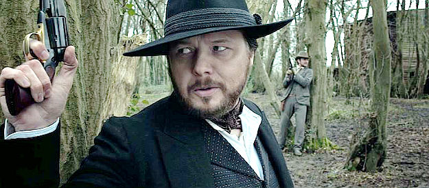 Shaun Dooley as Calhoun, on the watch for trouble from the woods in  Blood Moon (2015)