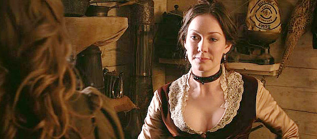 Anna Skellern as Marie Cooper, a former saloon owner trying to fend off two lustful outlaws in Blood Moon (2015)