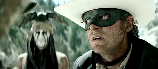 Armie Hammer as John Reid, aka The Lone Ranger, disagreeing with Tonto over the approach to take in The Lone Ranger (2013)