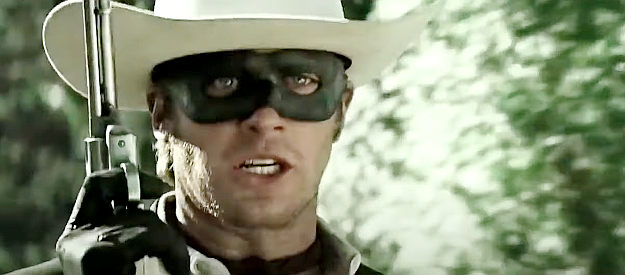 Armie Hammer as John Reid, aka The Lone Ranger, issuing a silver-bullet warning in The Lone Ranger (2013)